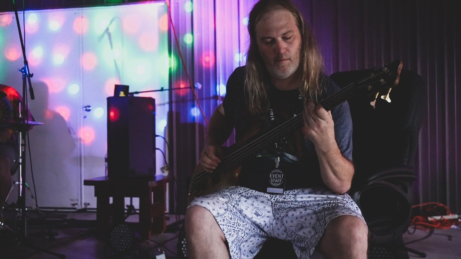 Gavlan Cheek playing bass on stage